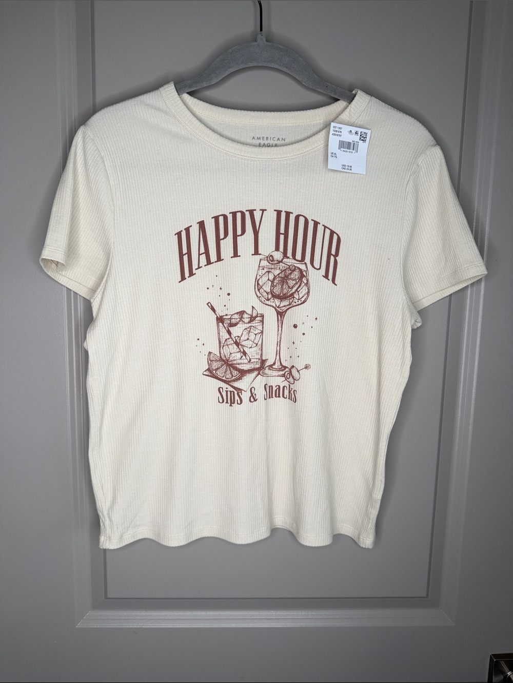 American Eagle Cream Ribbed Tee with Brown Graphic